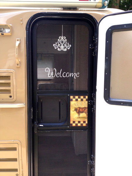 Mrs. Padilly's Completed Stenciling of Screen Door with Chandelier and Welcome Sign
