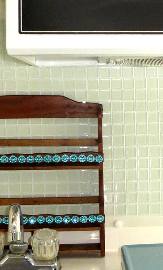Glass Tile installed in a Casita Travel Trailer with Brown Spice Rack