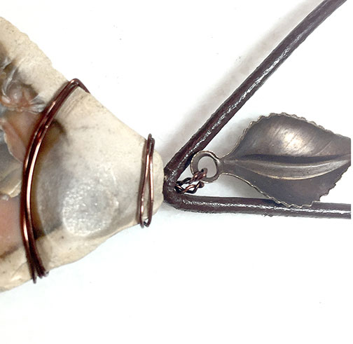 Adding a leaf charm with wire to a rock
