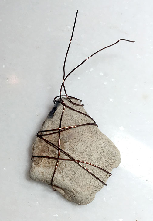 Attaching a leaf charm with wire to rock